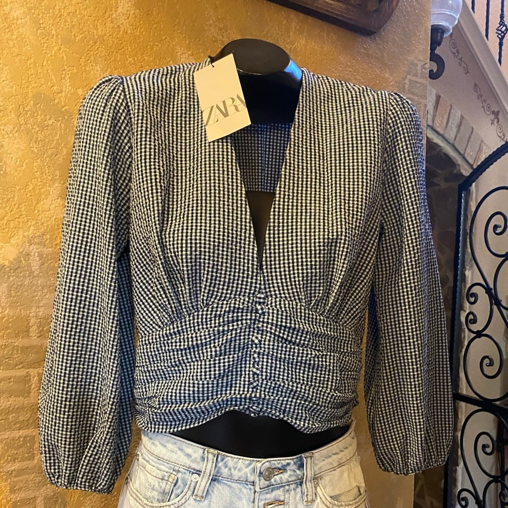 Blue and white striped top